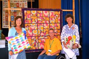 Presentation of cheque to New Forest Disability Photo of the Mother's Day workshop
